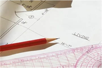 Photo of pencil sitting on top of floor plans