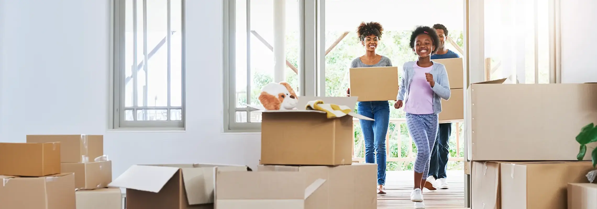 Stock photo of a family moving in