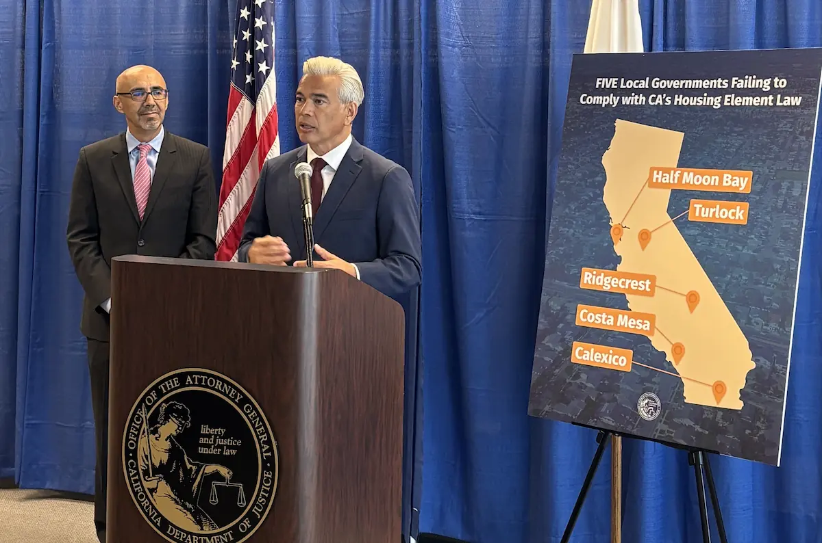 California Attorney General Bonta and HCD Director Velasquez speaking at the press conference