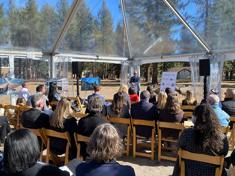 HCD Director Gustavo Velasquez at the site of Sugar Pine Village.