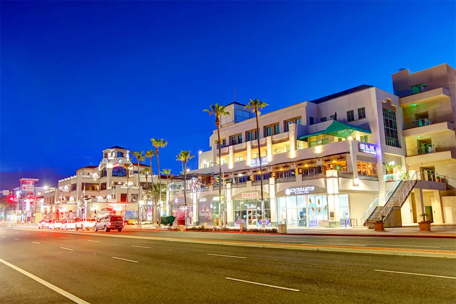 The photograph showcases the vibrant and colorful cityscape of the popular tourist destination, including tall buildings, residential areas, and busy streets.