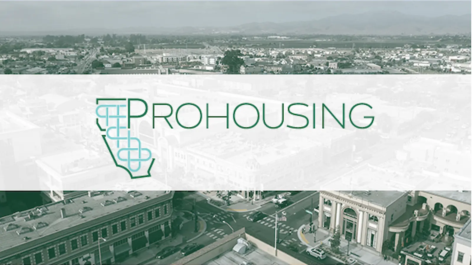 Prohousing banner over city scene.