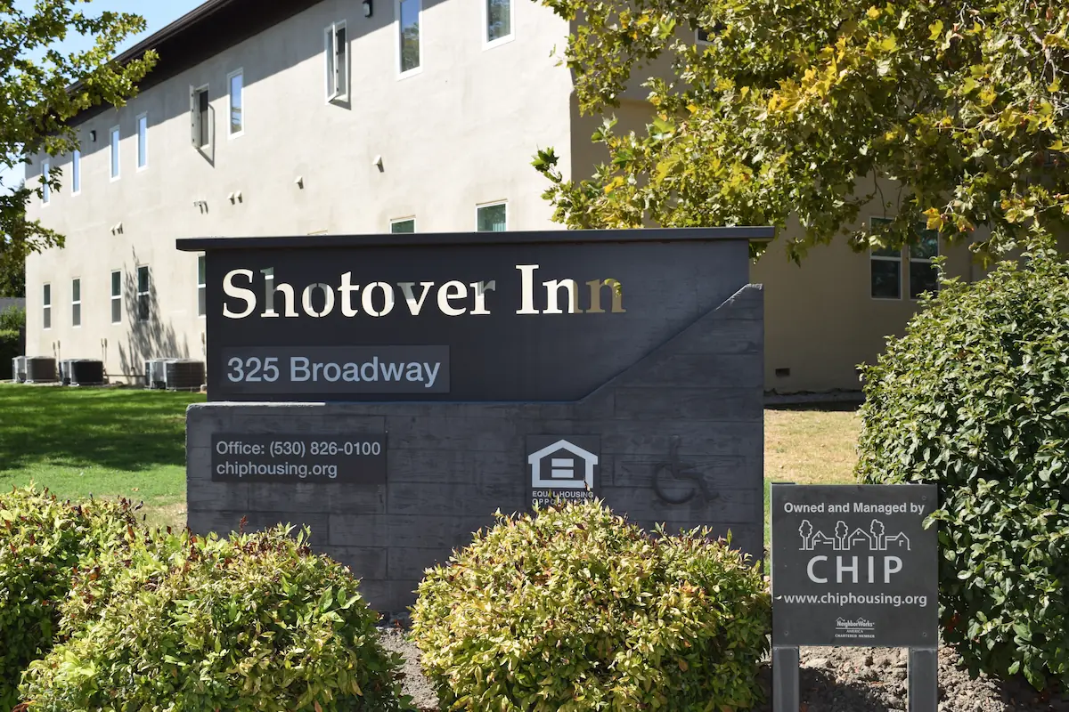 shotover apartment sign and exterior building view